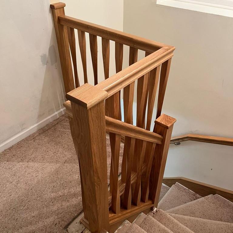 oak staircase renovation with twisted oak spindles