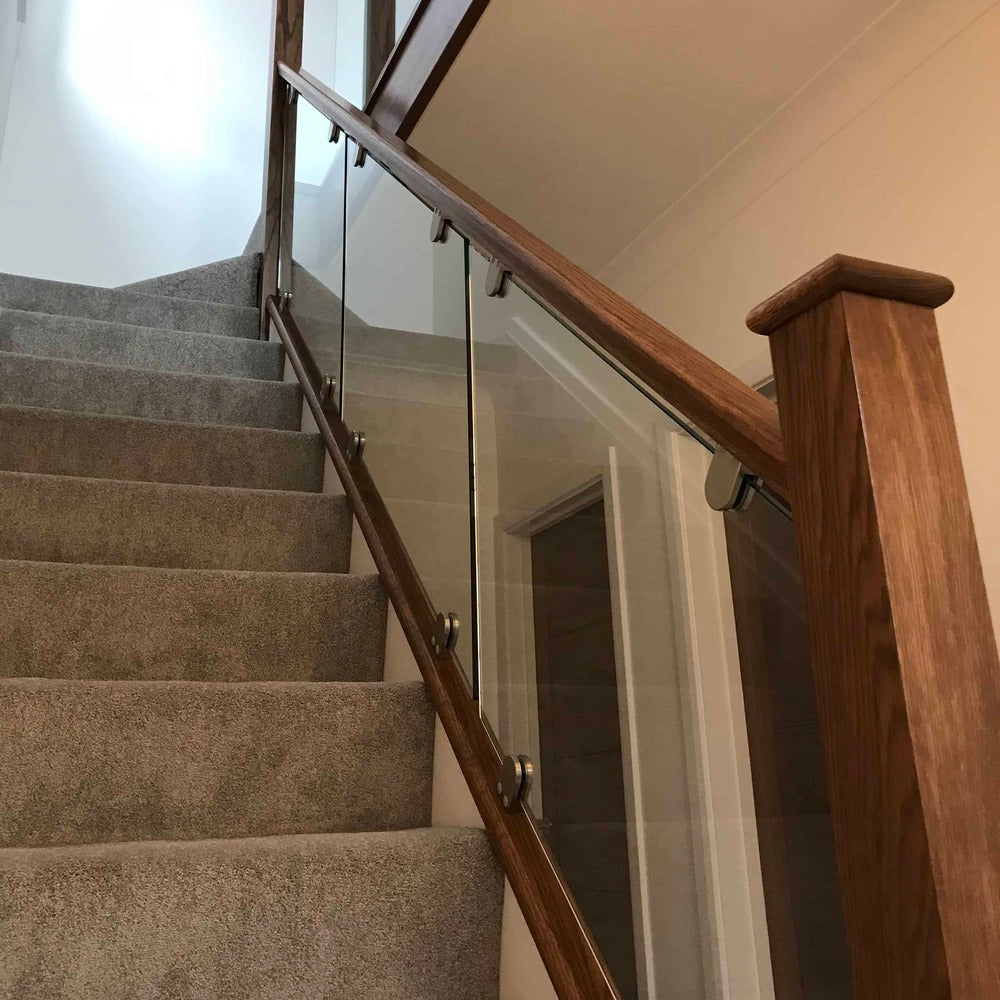 dark stained oak and glass staircase renovation